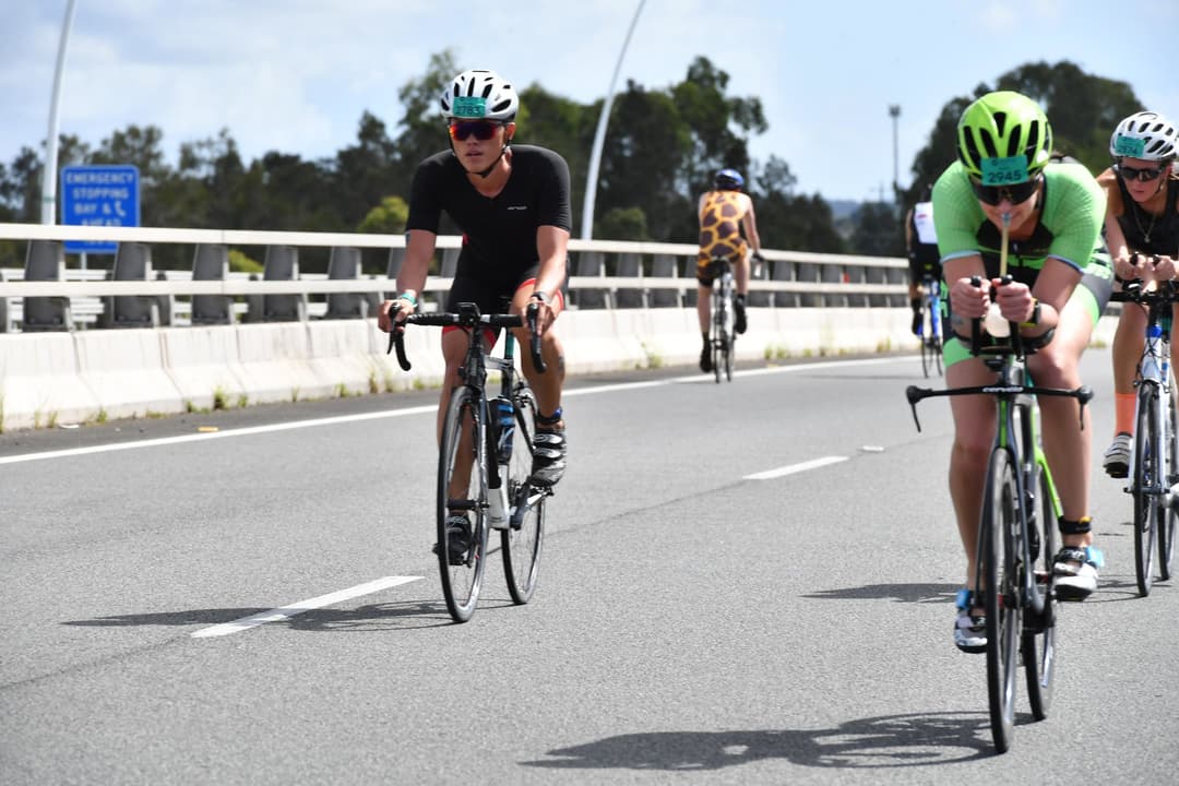 Landscape image of cyclists in a triathlon