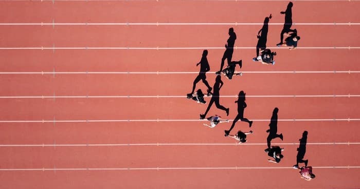 Birds eye view of runners on a track