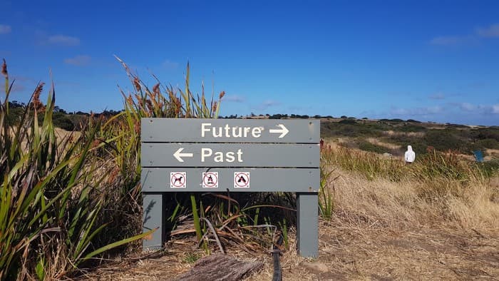 Directional sign on a trail by Hadija Saidi on Unsplash